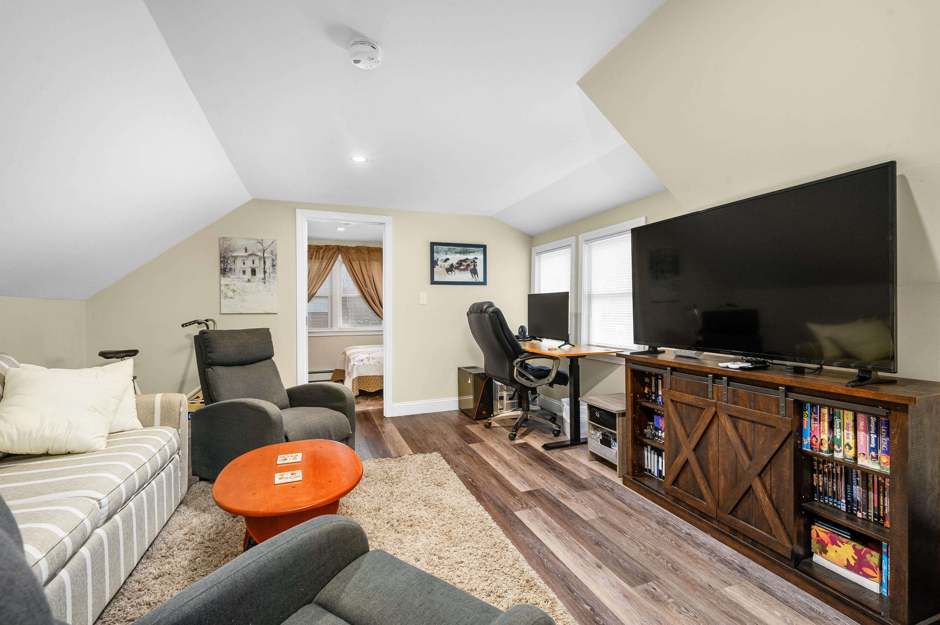 70 High School Road Hyannis, MA 02601 - Photo 7 of 23 a living room with furniture and a flat screen tv