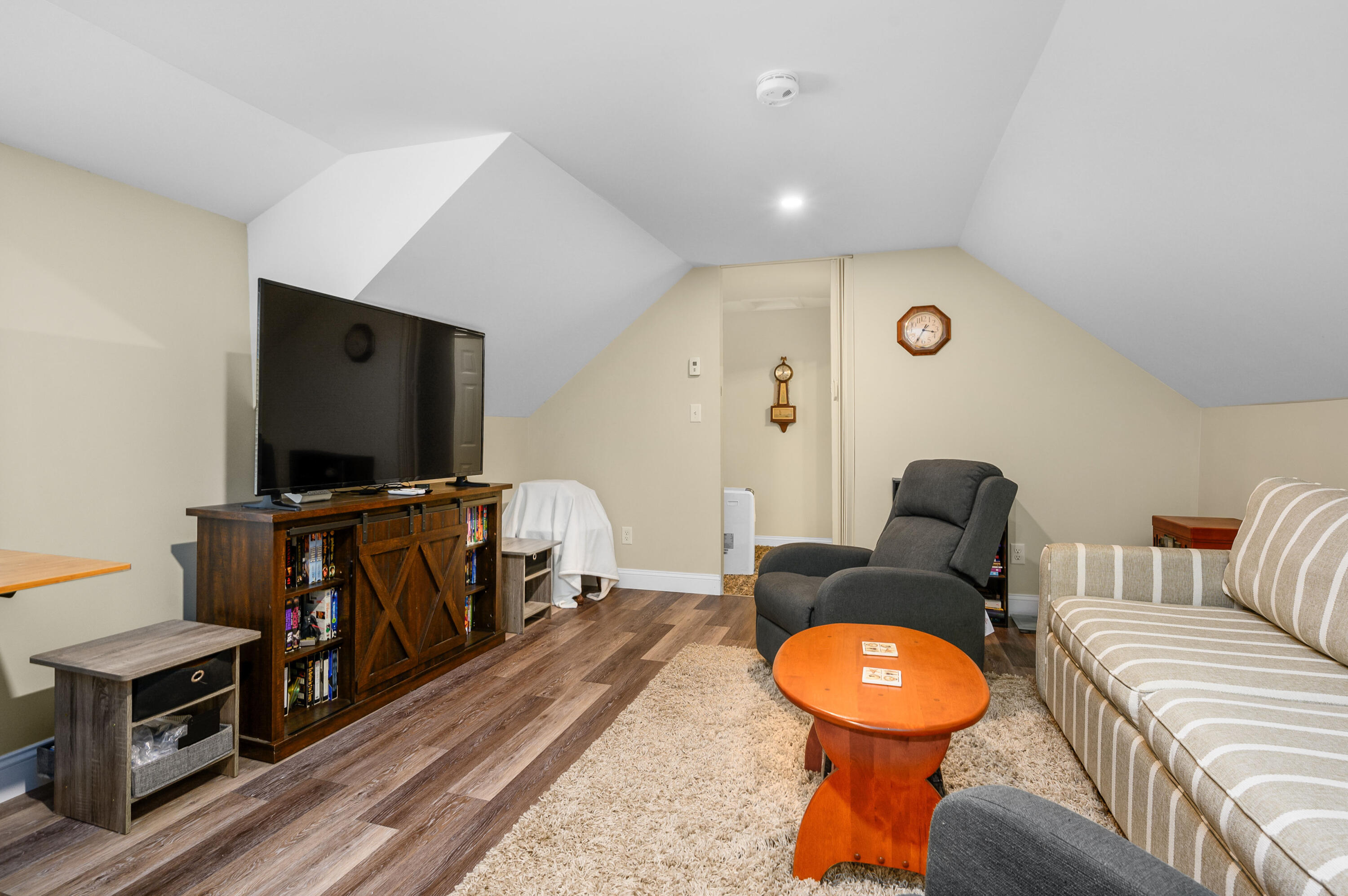 70 High School Road Hyannis, MA 02601 - Photo 8 of 23 a living room with furniture and a flat screen tv