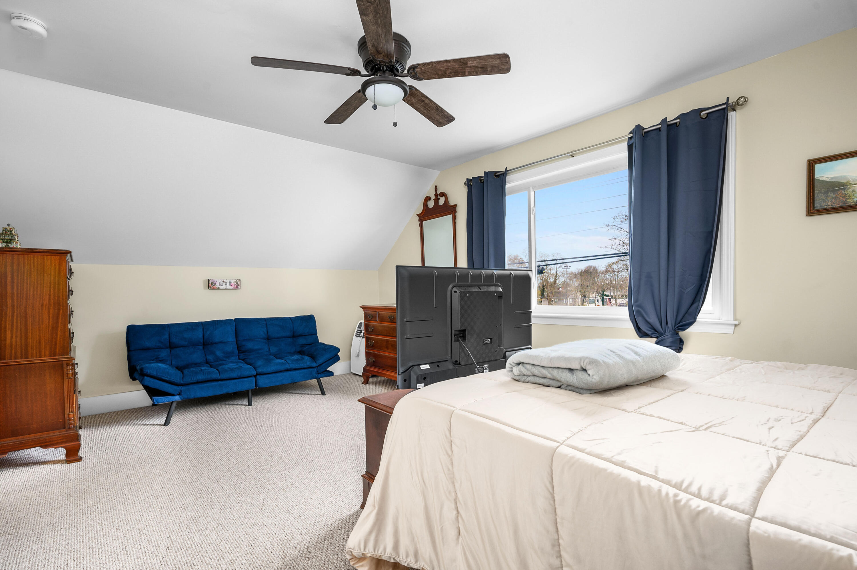 70 High School Road Hyannis, MA 02601 - Photo 9 of 23 a bedroom with a bed and a dresser