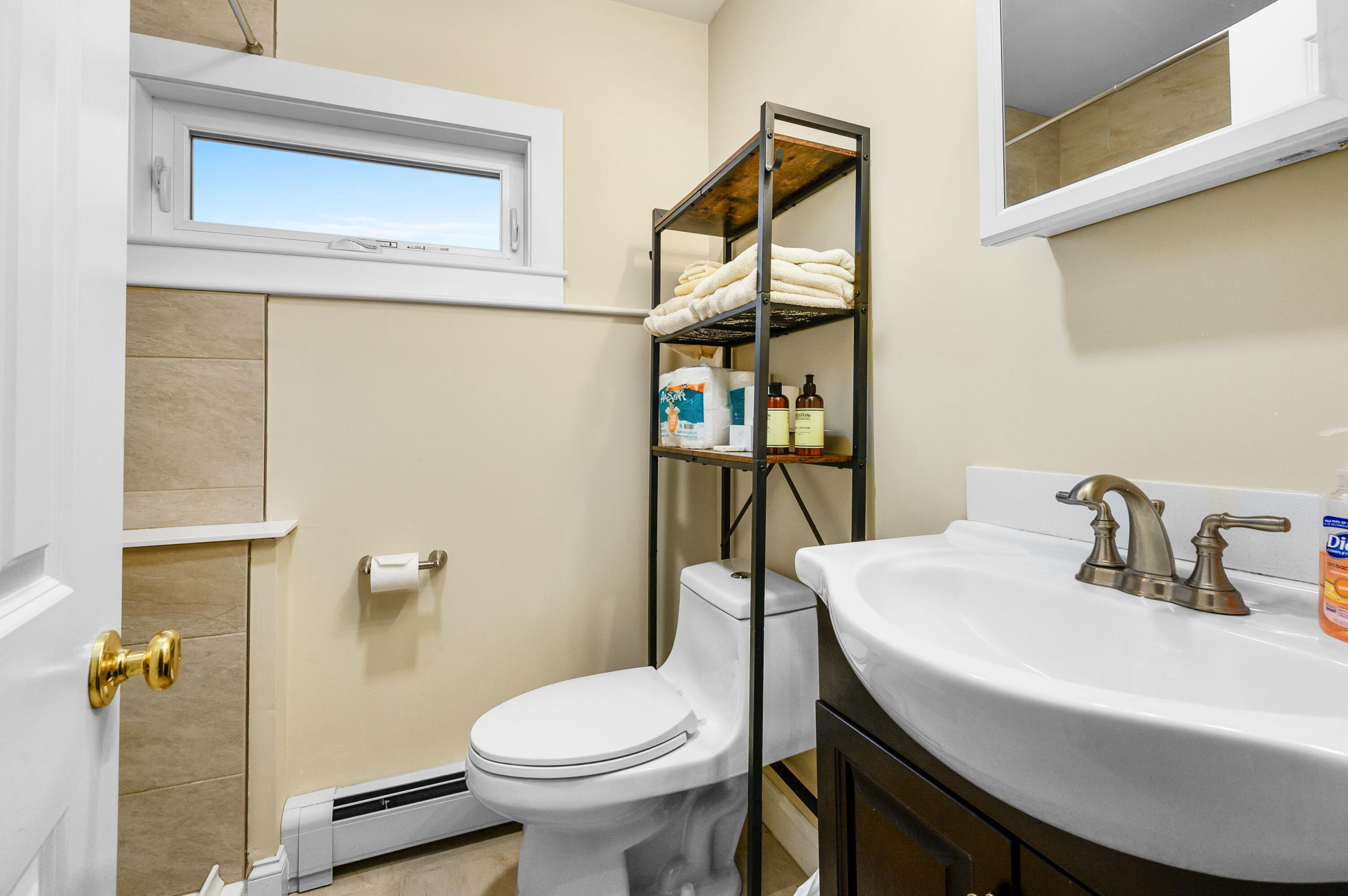 70 High School Road Hyannis, MA 02601 - Photo 10 of 23 a bathroom with a sink toilet and mirror