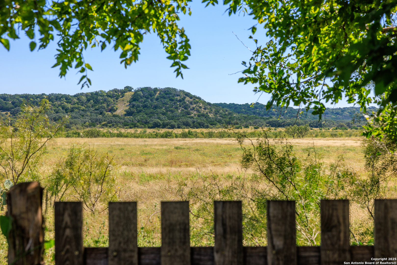 9402 Doss-Spring Creek Road Doss, TX 78618 - Photo 23 of 42 a view of a lake with a mountain