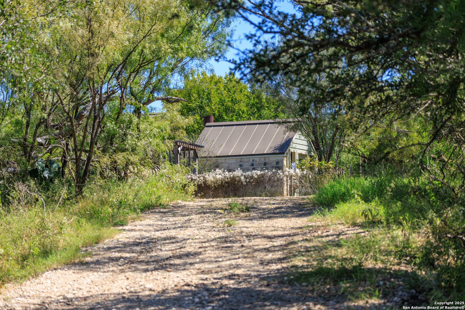 9402 Doss-Spring Creek Road Doss, TX 78618 - Photo 38 of 42 a view of a back yard