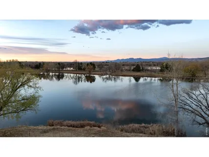 a view of lake with mountain