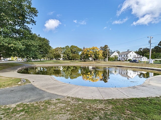 1 Pleasant Street, Unit 307 Cohasset, MA 02025 - Photo 12 of 24 a view of swimming pool with a yard