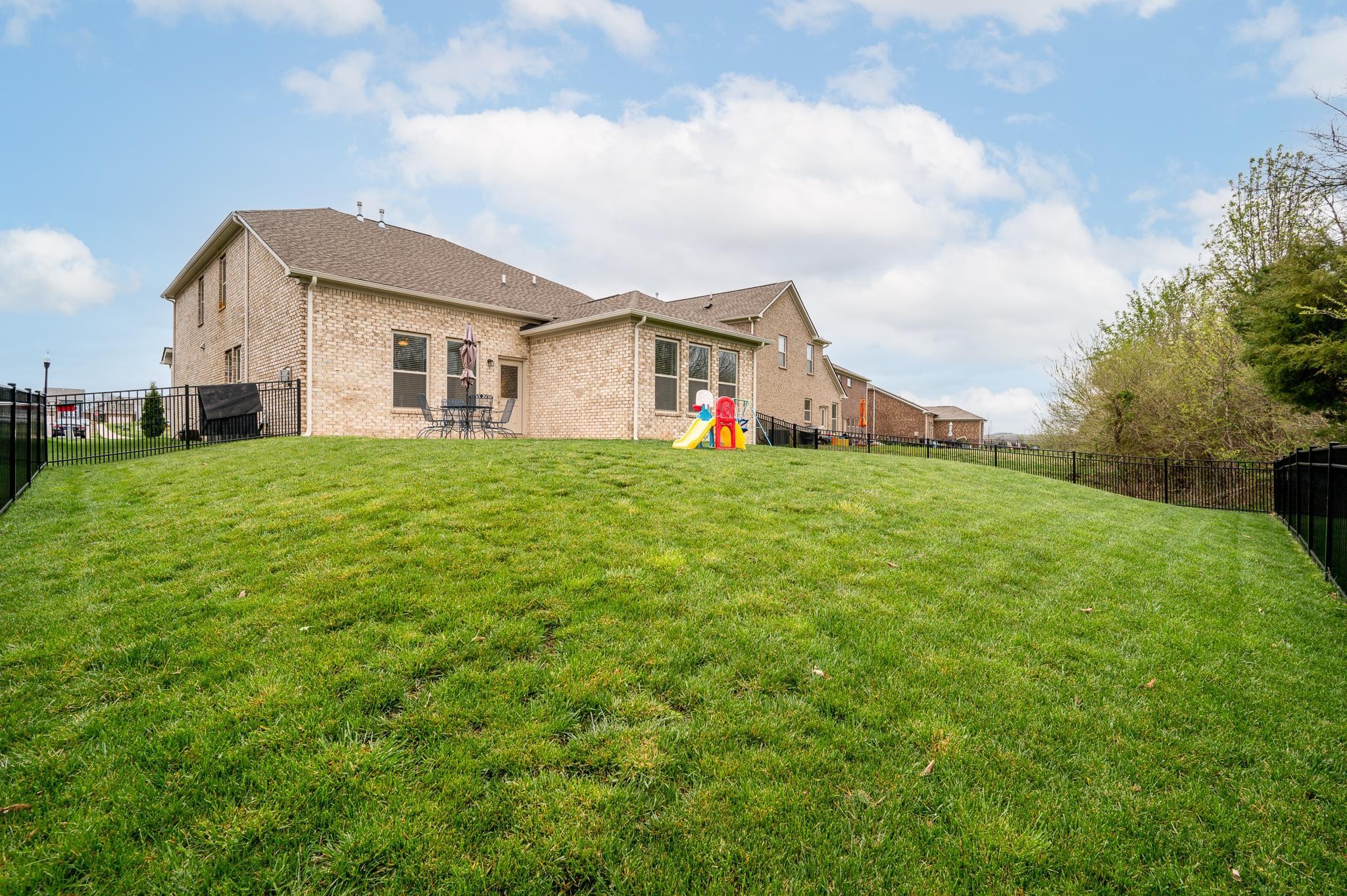 3130 Rift Lane Murfreesboro, TN 37130 - Photo 25 of 31 a view of a house with a yard and large trees