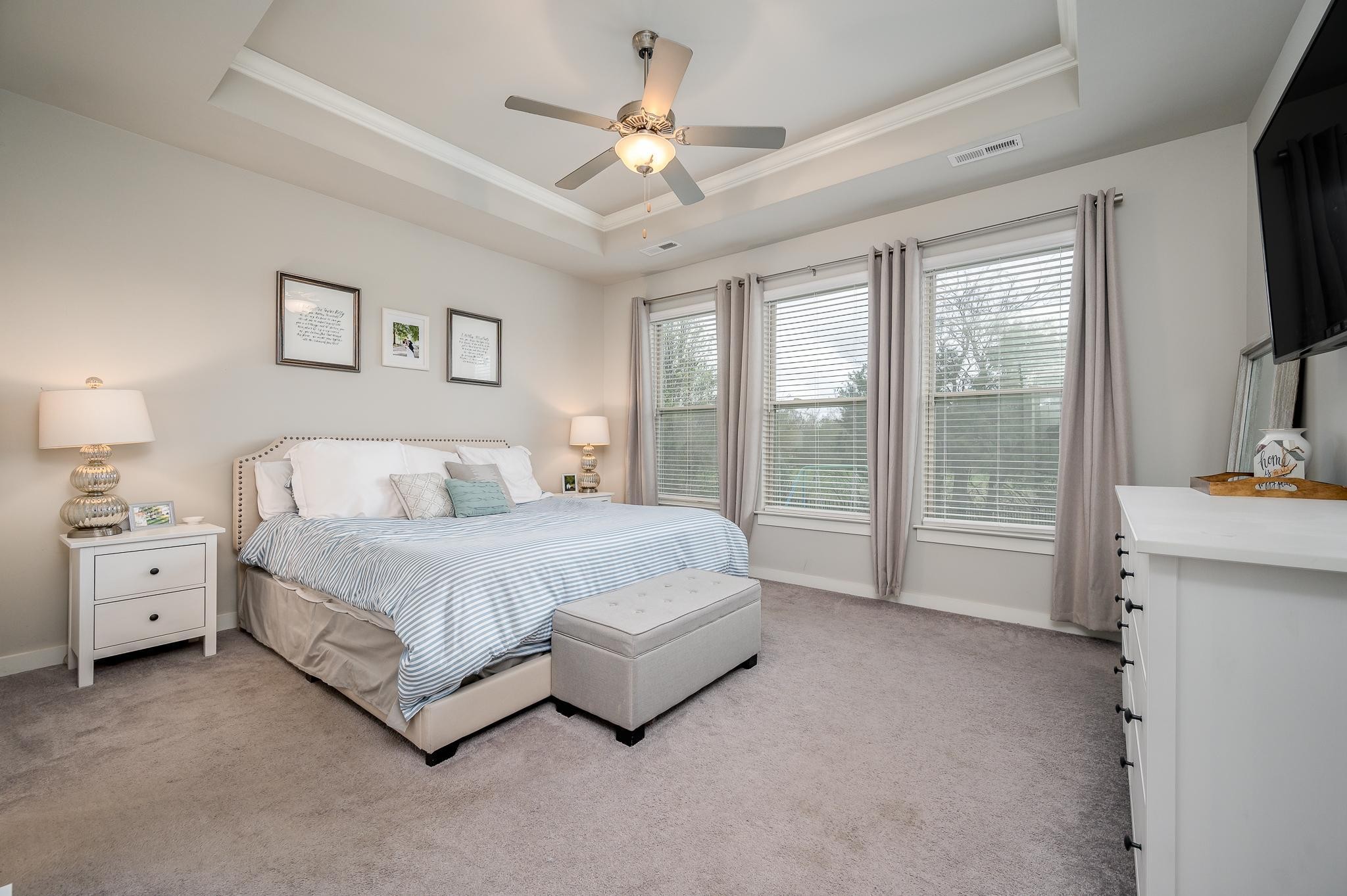 3130 Rift Lane Murfreesboro, TN 37130 - Photo 8 of 31 a spacious bedroom with a bed and a flat screen tv