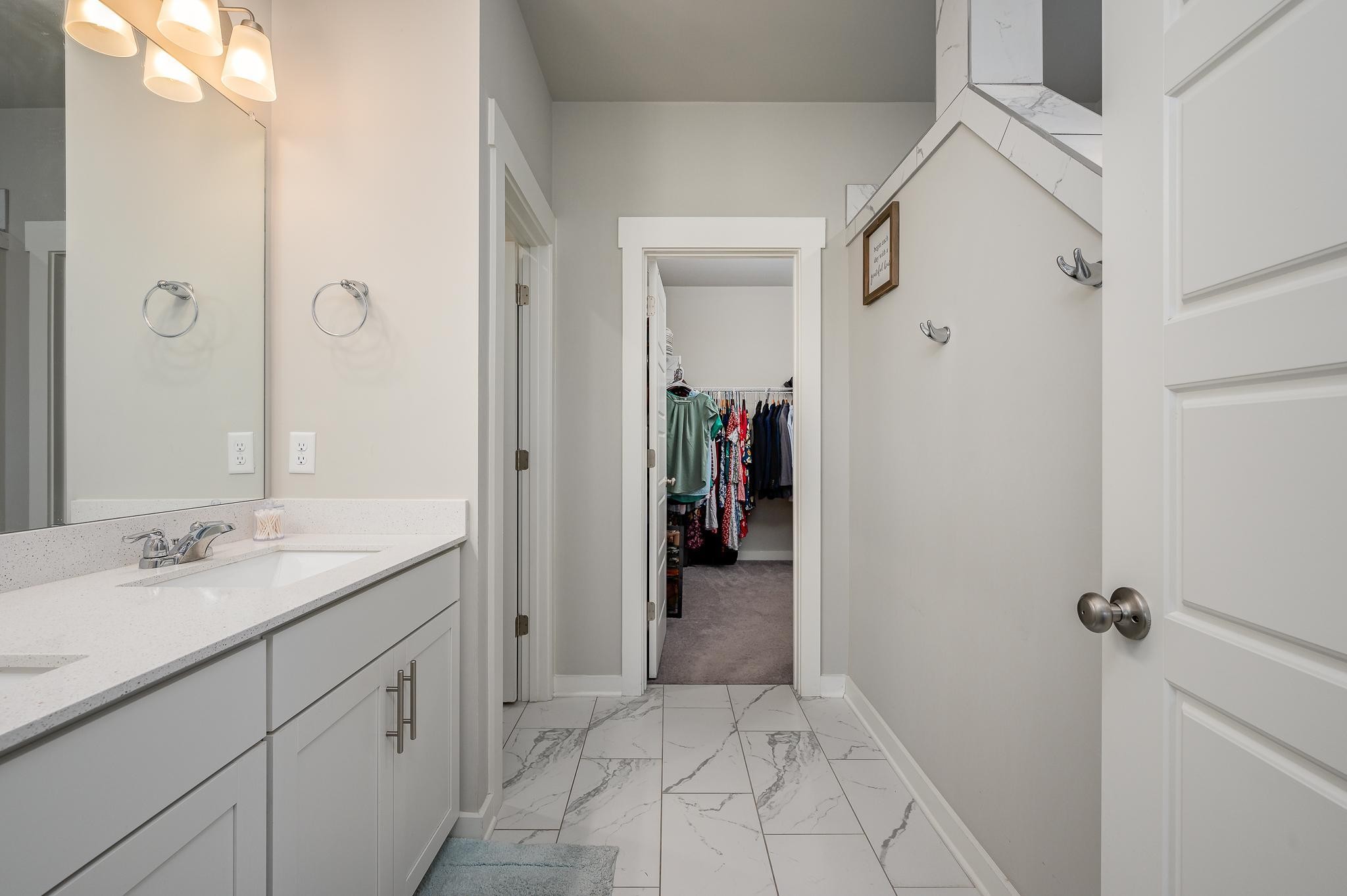 3130 Rift Lane Murfreesboro, TN 37130 - Photo 10 of 31 a bathroom with a sink and a mirror