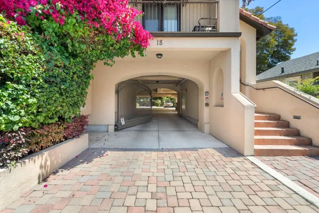 a view of entryway with flower pots