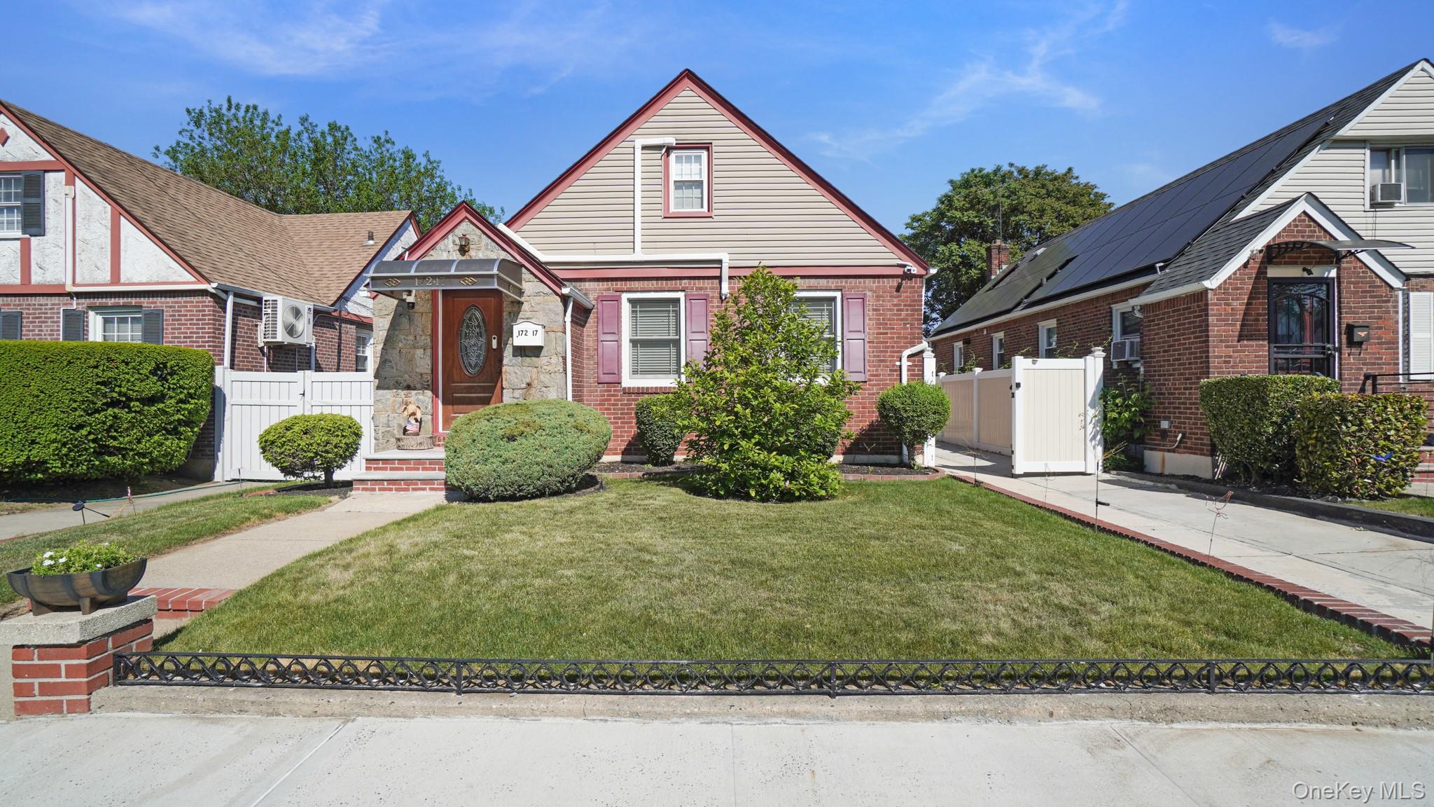 172-17 Amelia Road Queens, NY 11434 - Photo 1 of 18 a front view of a house with a yard
