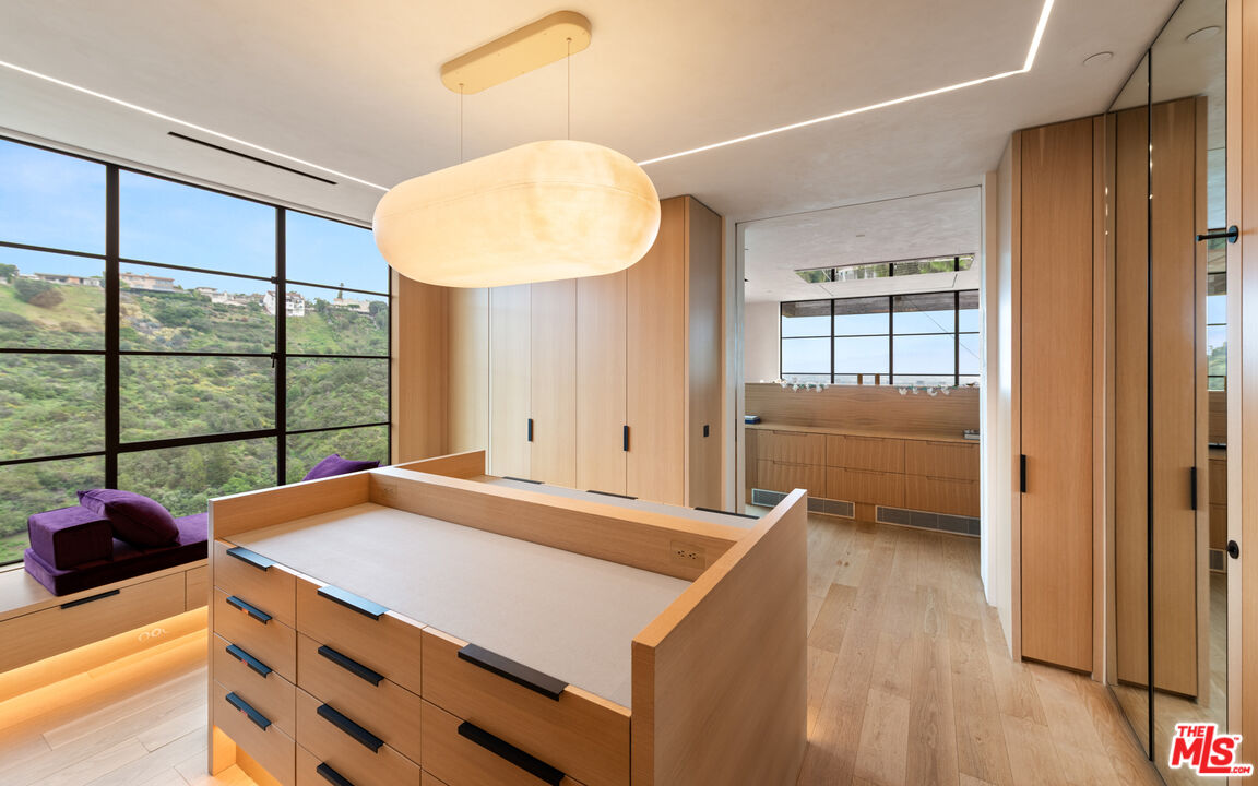 11531 Orum Road Los Angeles, CA 90049 - Photo 14 of 27 a room with a bed and a window