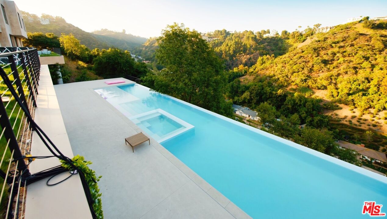 11531 Orum Road Los Angeles, CA 90049 - Photo 25 of 27 a view of a balcony with an outdoor space