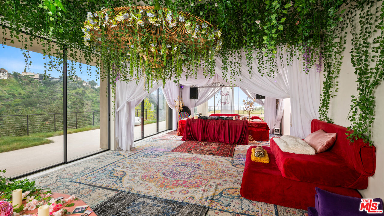 11531 Orum Road Los Angeles, CA 90049 - Photo 10 of 27 a view of balcony with two chairs and a table