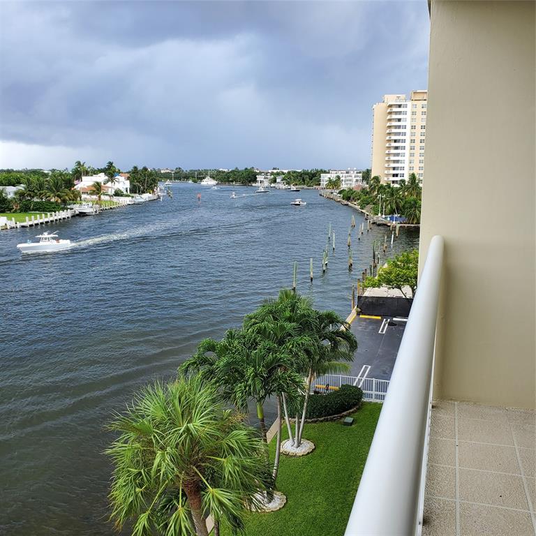 2611 North Riverside Drive, Unit 504 Pompano Beach, FL 33062 - Photo 18 of 35 a view of a lake with a yard