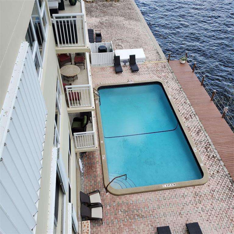 2611 North Riverside Drive, Unit 504 Pompano Beach, FL 33062 - Photo 27 of 35 a view of roof deck with patio