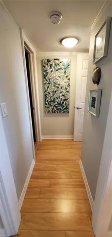 a kitchen with stainless steel appliances granite countertop a sink a stove microwave and cabinets