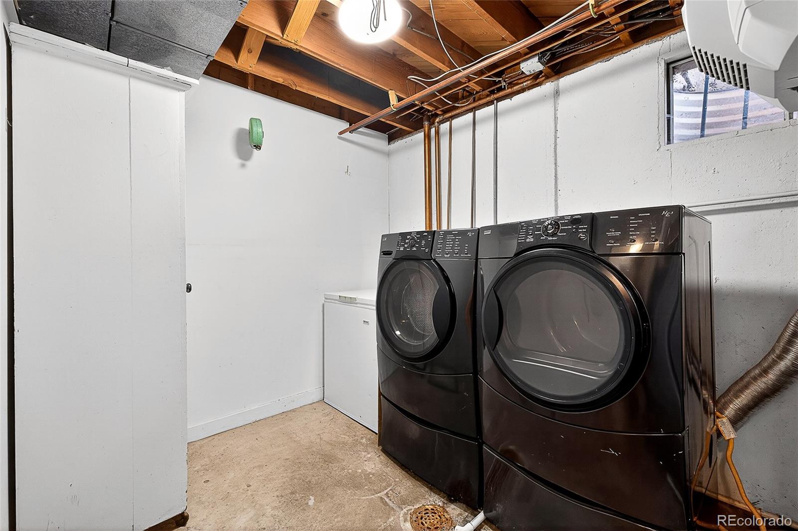 2768 South Mabry Way Denver, CO 80236 - Photo 25 of 39 a utility room with dryer and washer