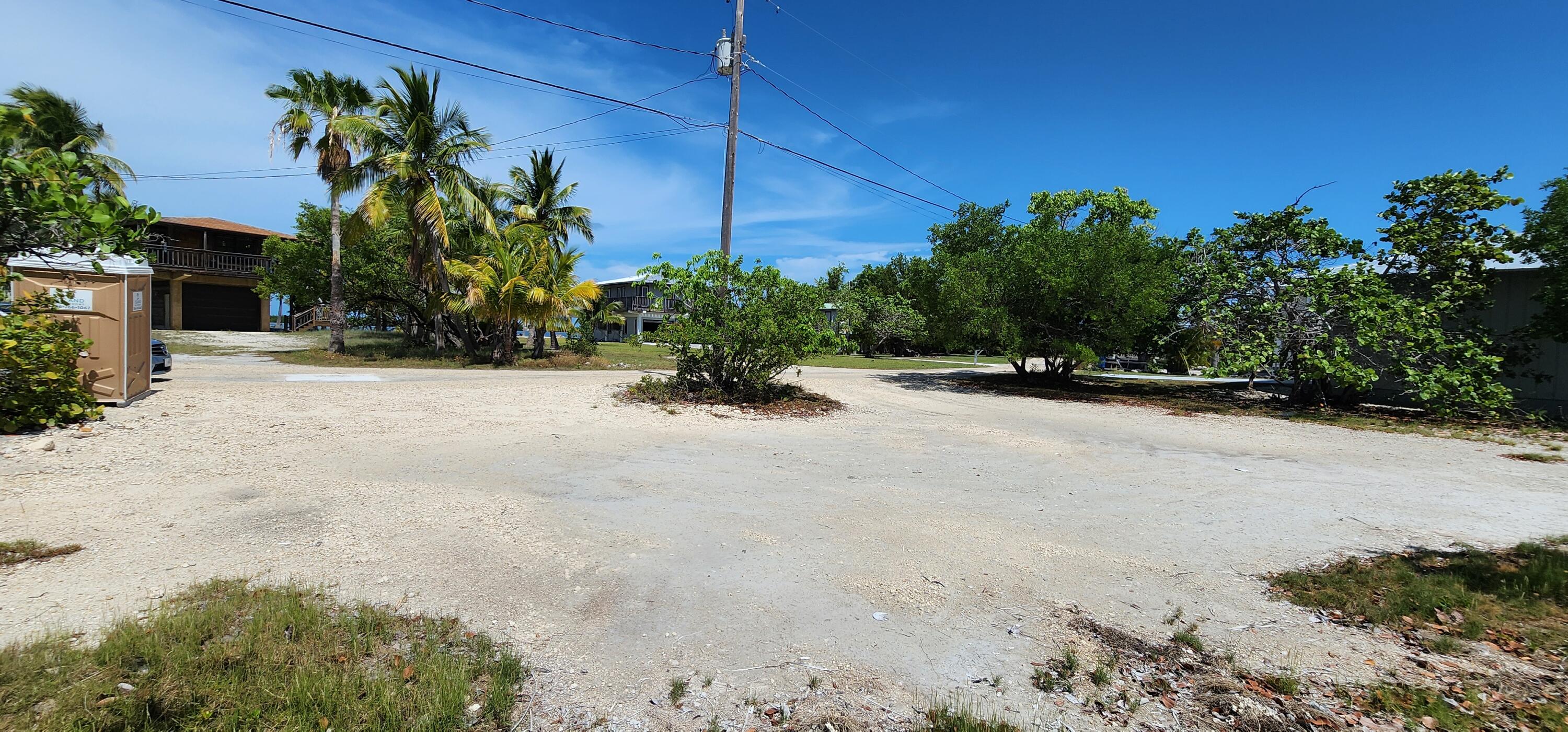 6 Coral Way Big Pine Key, FL 33043 - Photo 17 of 20 a view of a road with a building in the background