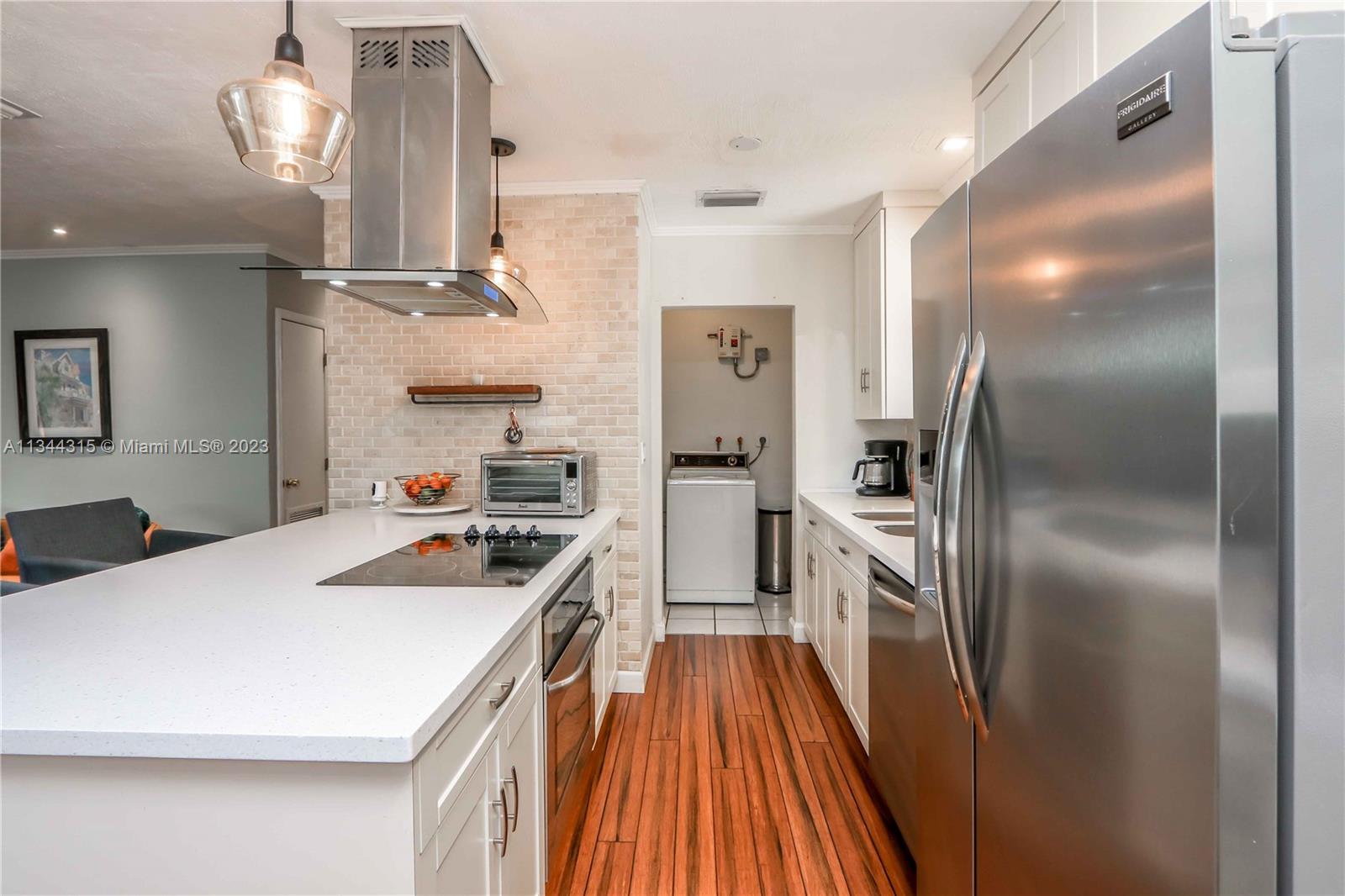 19310 Christmas Road Cutler Bay, FL 33157 - Photo 10 of 42 Open kitchen with cooking island and breakfast bar