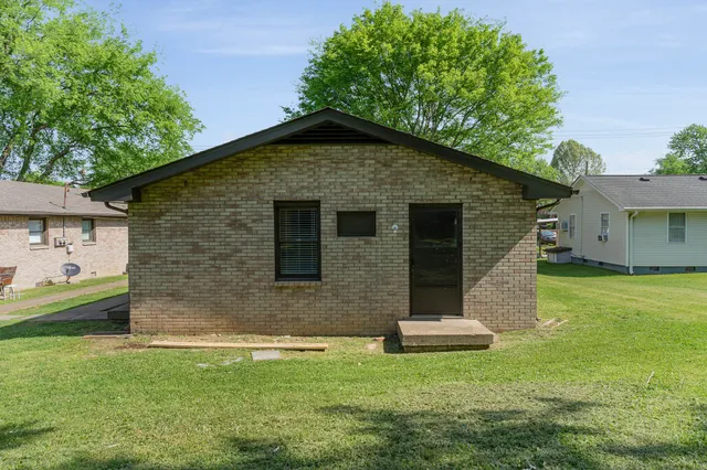 a front view of house with yard