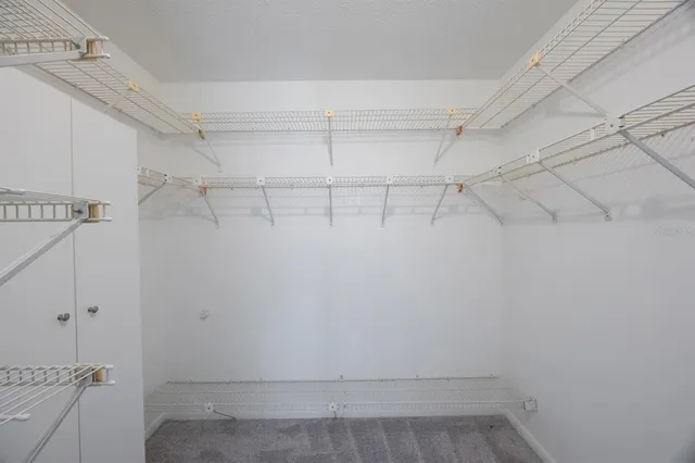 a view of a room with racks on the wall
