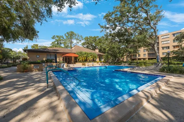 an aerial view of a house with outdoor space