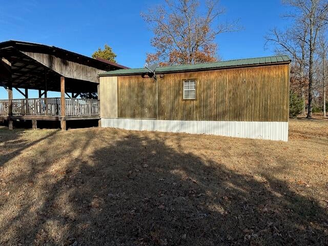 15748 South 4420 Road Bluejacket, OK 74333 - Photo 22 of 33 cabin side