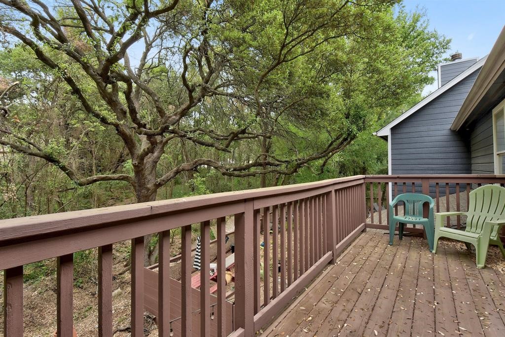 3201 South 5th Street, Unit B Austin, TX 78704 - Photo 14 of 25 a balcony with wooden floor and fence