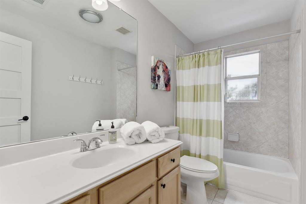 3201 South 5th Street, Unit B Austin, TX 78704 - Photo 23 of 25 a bathroom with a sink toilet and shower