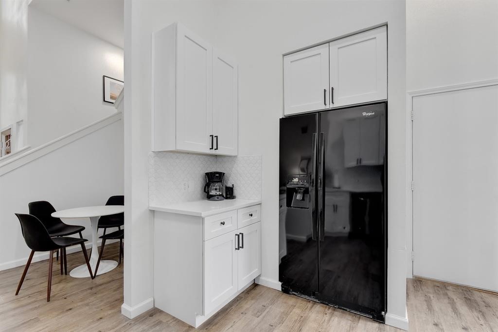 3201 South 5th Street, Unit B Austin, TX 78704 - Photo 25 of 25 a kitchen with stainless steel appliances a refrigerator and cabinets