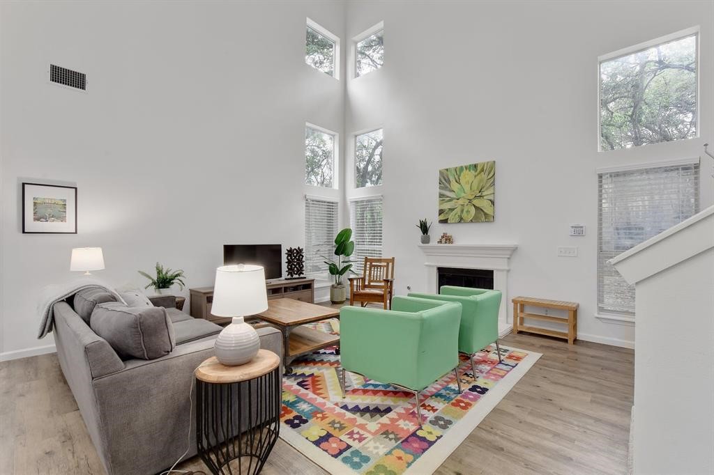 3201 South 5th Street, Unit B Austin, TX 78704 - Photo 4 of 25 a living room with furniture and a fireplace