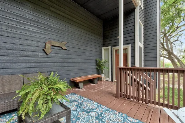 a living room with furniture fireplace and a flat screen tv