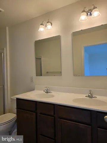 a bathroom with a sink and a toilet