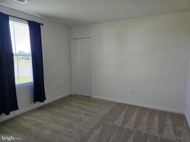 an empty room with an entryway