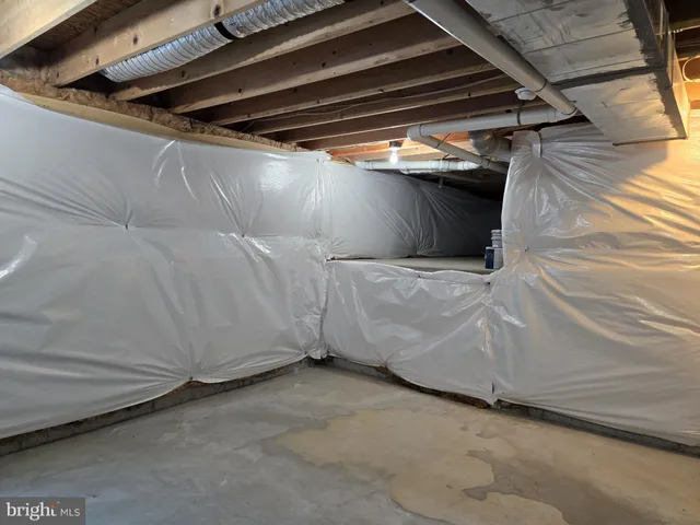 a view of a field with an ocean