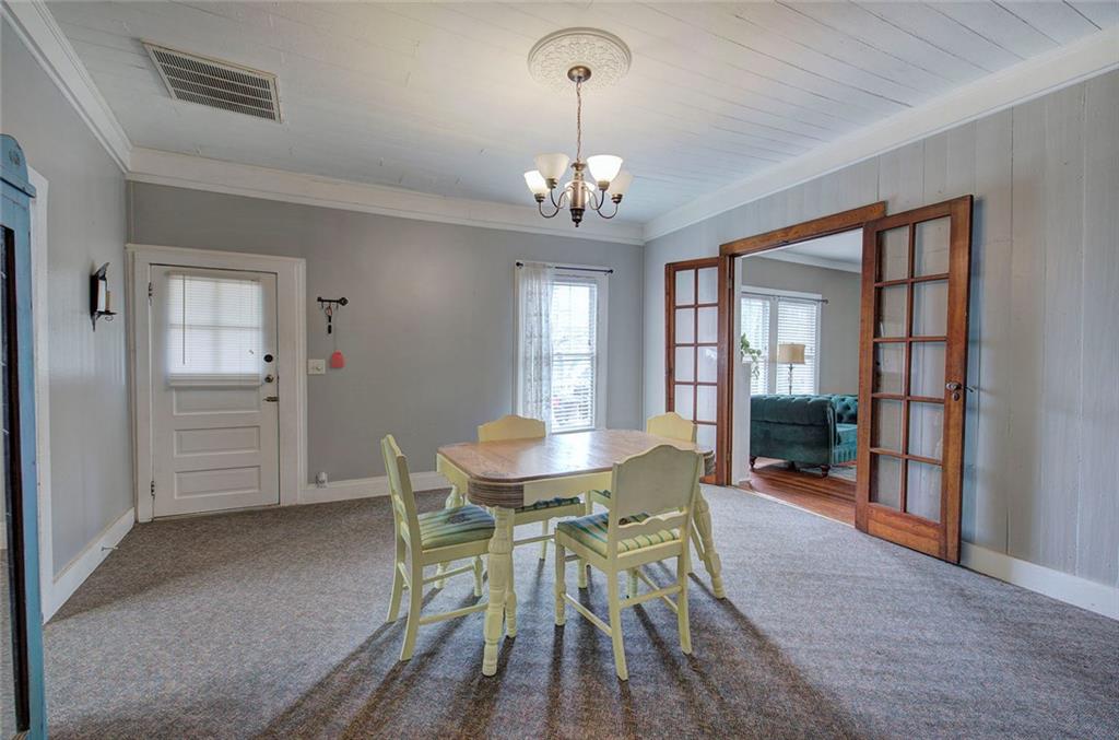 401 Edison Street Menlo, GA 30731 - Photo 12 of 34 a view of a dining room with furniture window and wooden floor