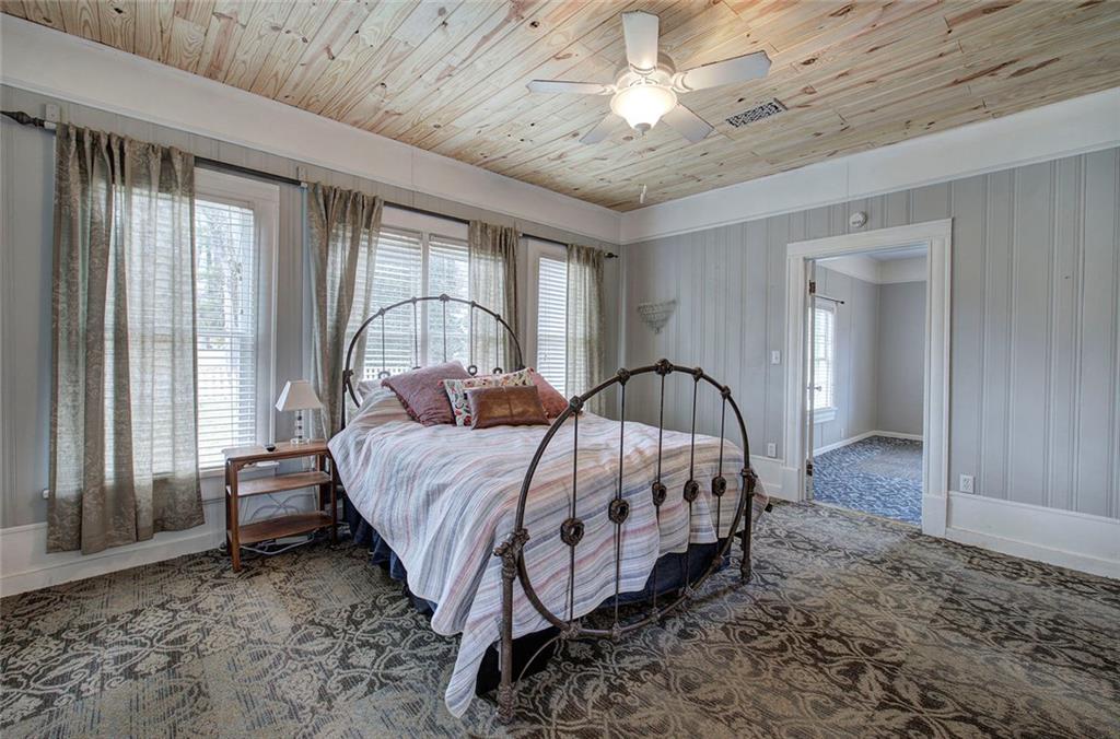 401 Edison Street Menlo, GA 30731 - Photo 23 of 34 a bed sitting in a spacious bedroom next to a window