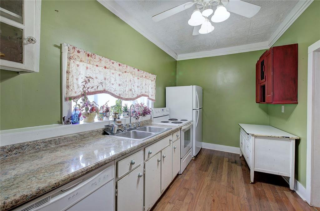 401 Edison Street Menlo, GA 30731 - Photo 32 of 34 a kitchen with a sink and cabinets
