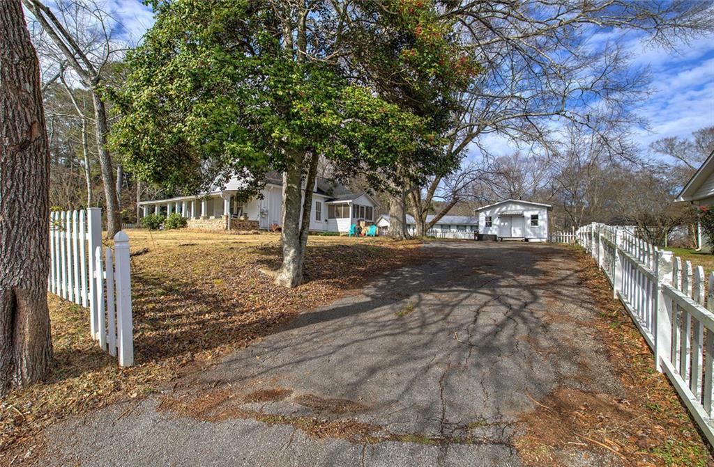 401 Edison Street Menlo, GA 30731 - Photo 7 of 34 a view of a house with a yard