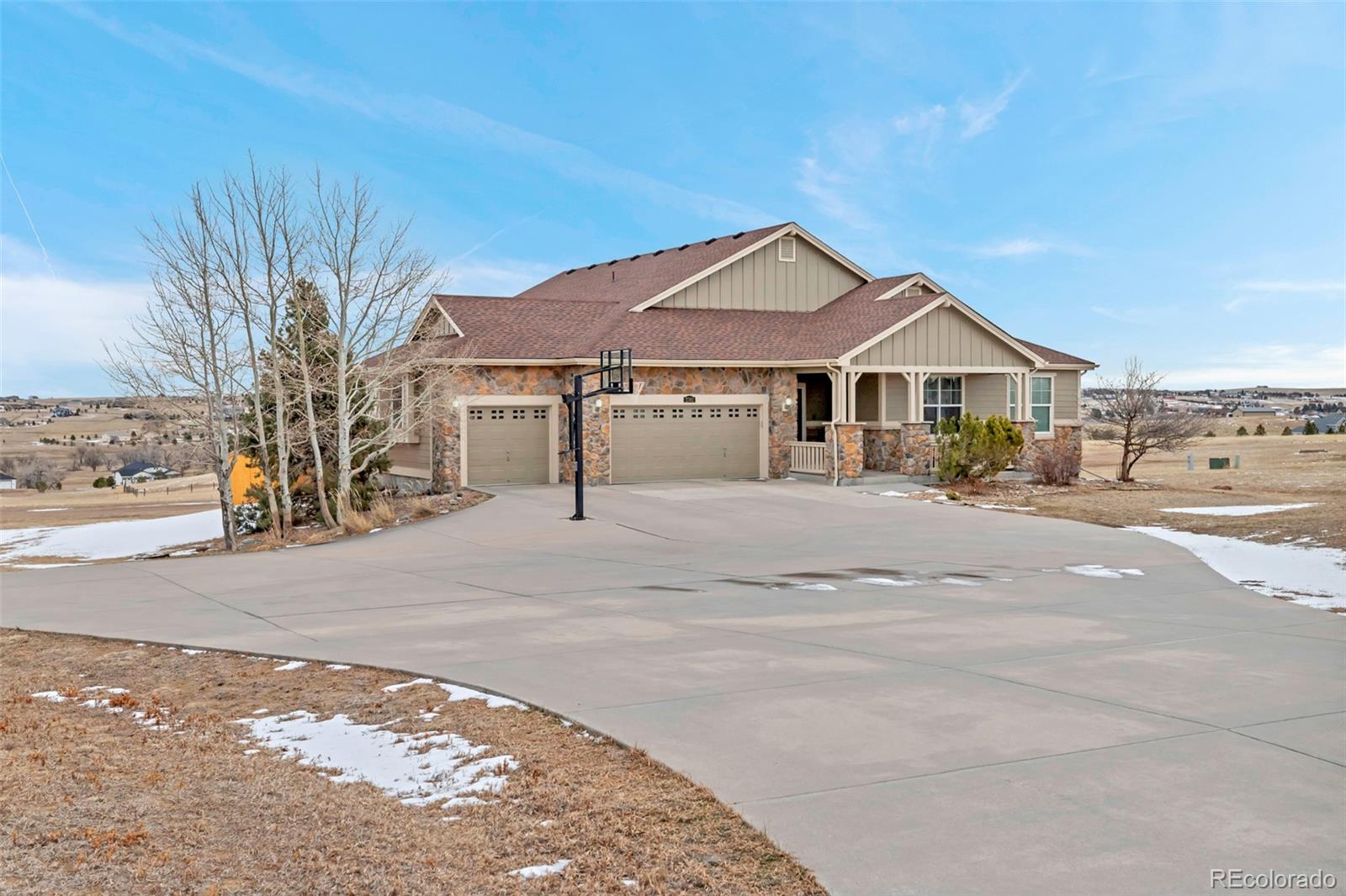 2382 Antelope Ridge Trail Parker, CO 80138 - Photo 2 of 49 a front view of a house with a yard