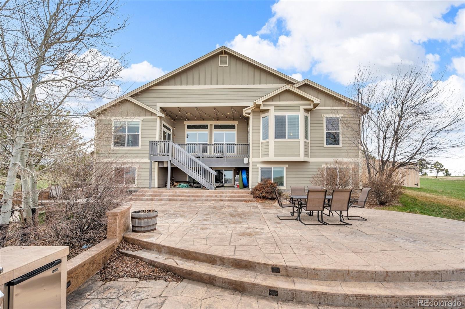2382 Antelope Ridge Trail Parker, CO 80138 - Photo 32 of 34 a view of a house with a yard