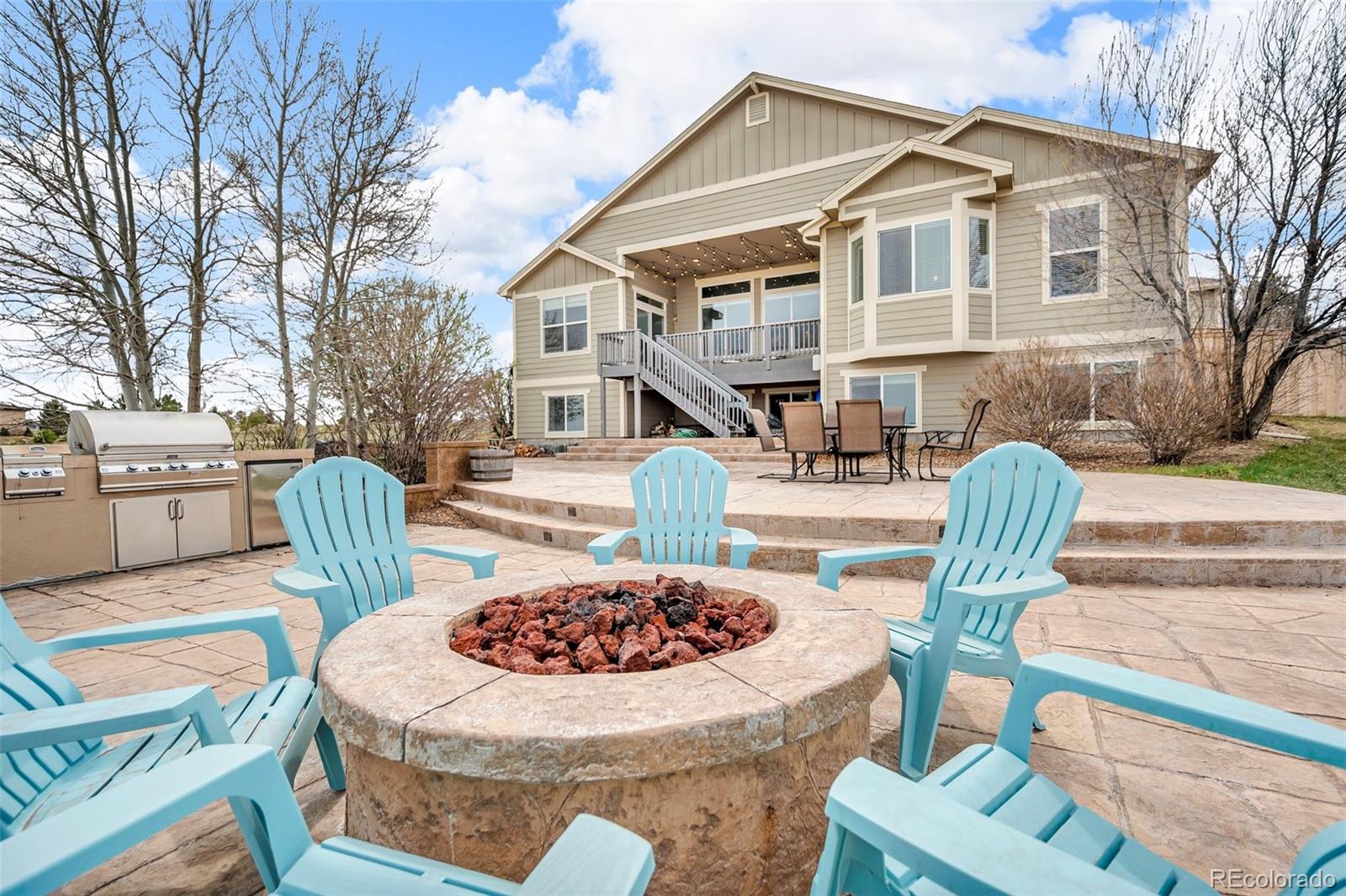 2382 Antelope Ridge Trail Parker, CO 80138 - Photo 49 of 49 a view of a patio with table and chairs