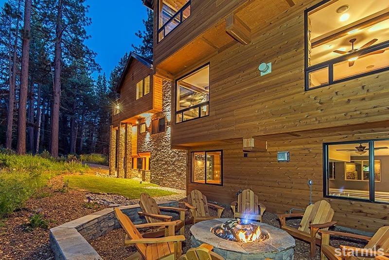 3739 Saddle Road South Lake Tahoe, CA 96150 - Photo 11 of 25 a backyard of a house with outdoor seating