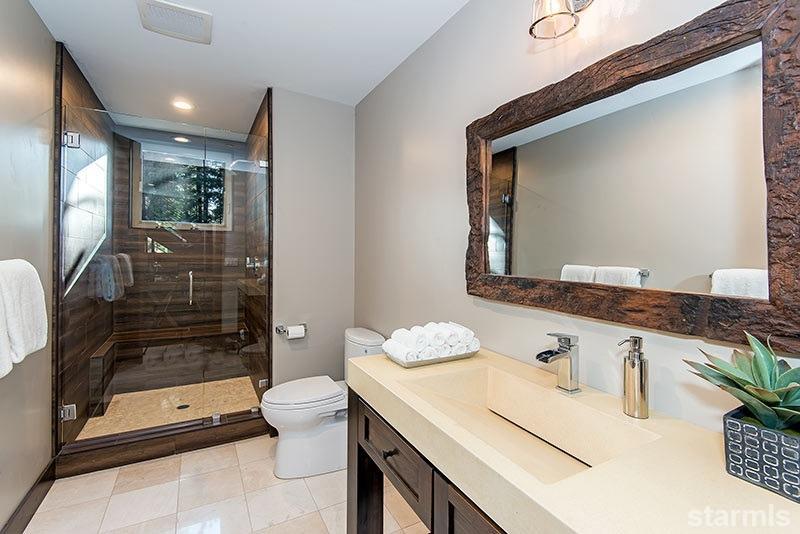 3739 Saddle Road South Lake Tahoe, CA 96150 - Photo 16 of 25 a bathroom with a sink a toilet and shower