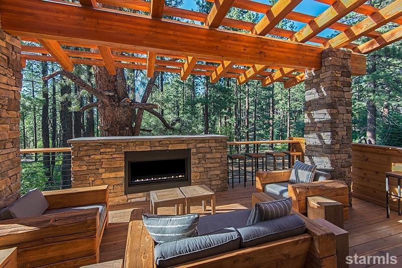 3739 Saddle Road South Lake Tahoe, CA 96150 - Photo 6 of 25 a outdoor living space with patio furniture and a fireplace