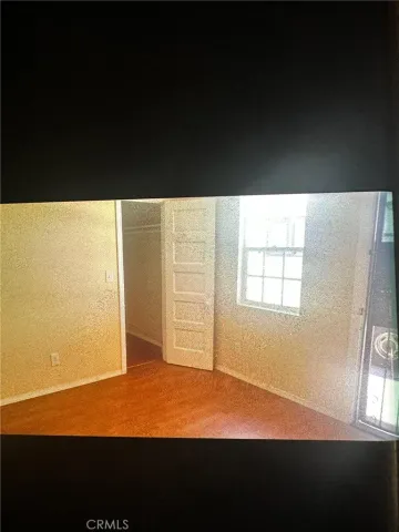 a room with furniture and a window