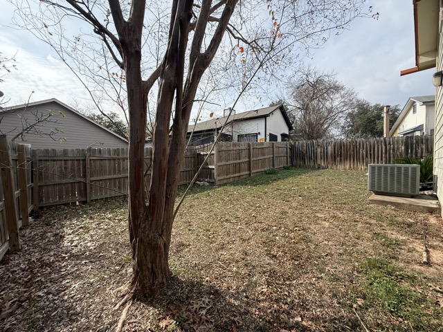 1809 Whitney Way Austin, TX 78741 - Photo 21 of 25 View of fenced backyard.