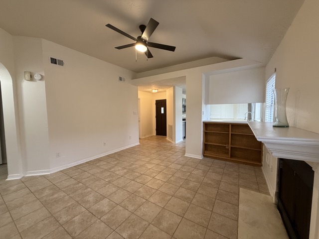 1809 Whitney Way Austin, TX 78741 - Photo 5 of 25 View from the living room to the front entryway.