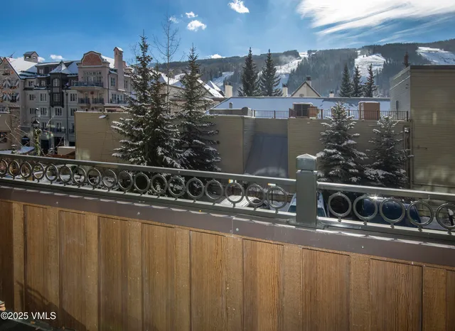 a view of a house with a street