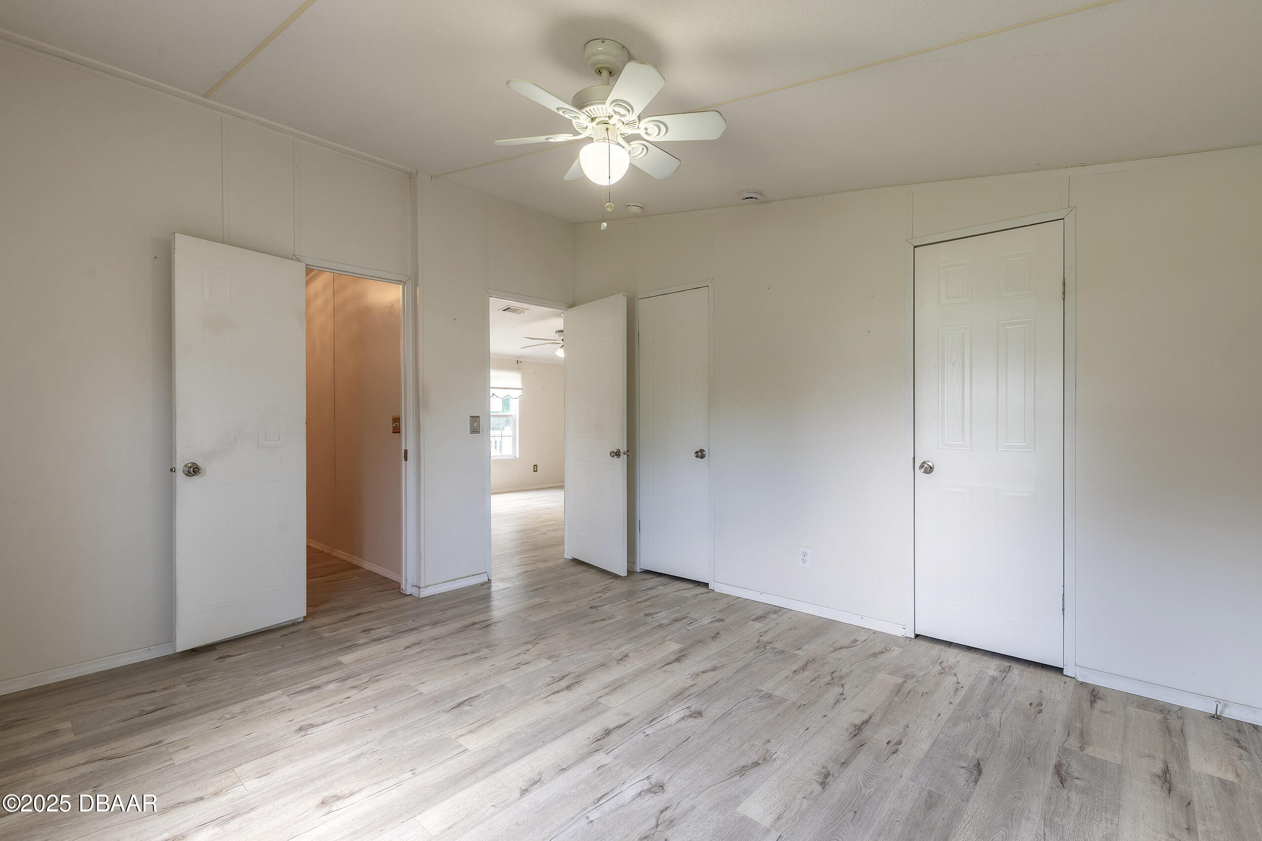 55721 Palmetto Road Astor, FL 32102 - Photo 17 of 27 a view of an empty room with a bathroom
