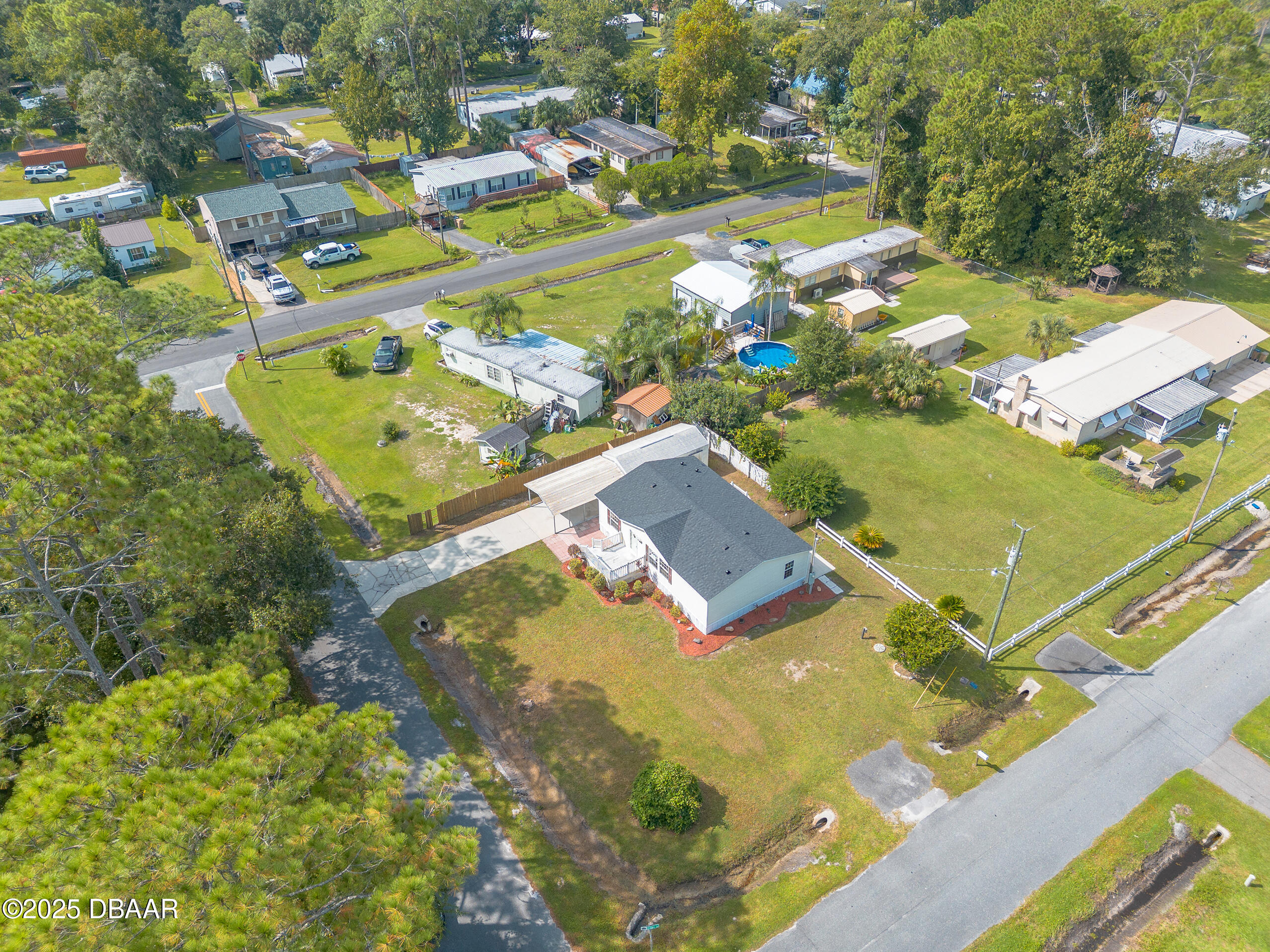 55721 Palmetto Road Astor, FL 32102 - Photo 26 of 27 an aerial view of residential houses with outdoor space